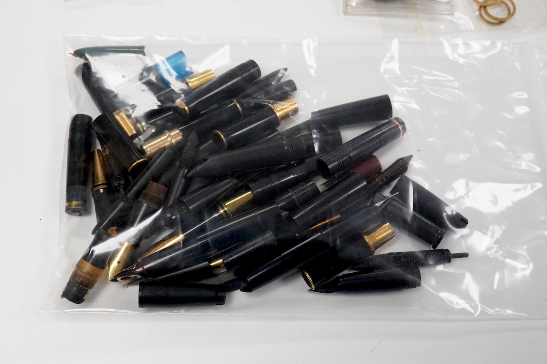 A collection of Parker Pens spares to include, clips, section and other items